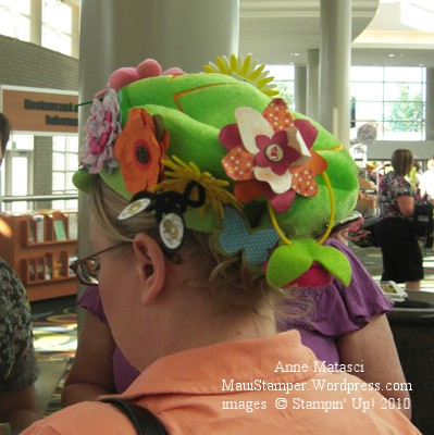 Green fleece hat with flowers