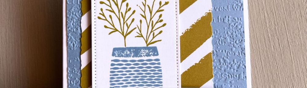 handmade card with a large vase with stems and a striped paper accent on a white card base with the sentiment “thank you”