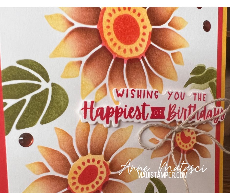 A handmade card with floral designs and the sentiment “wishing you the happiest of birthdays”