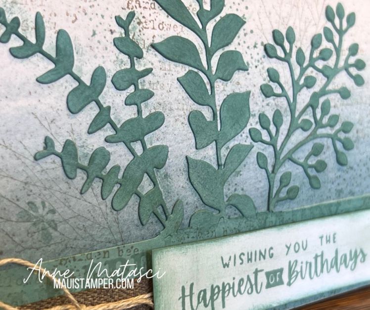 A handmade card with 3 plant stems and the text "wishing you the happiest of birthdays"