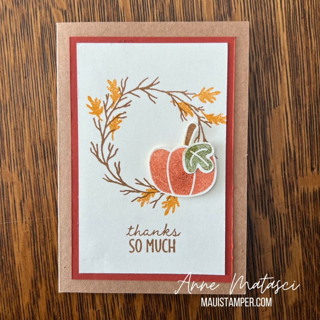 a tan note card with the image of a wreath and a pumpkin. Text is "thanks so much"