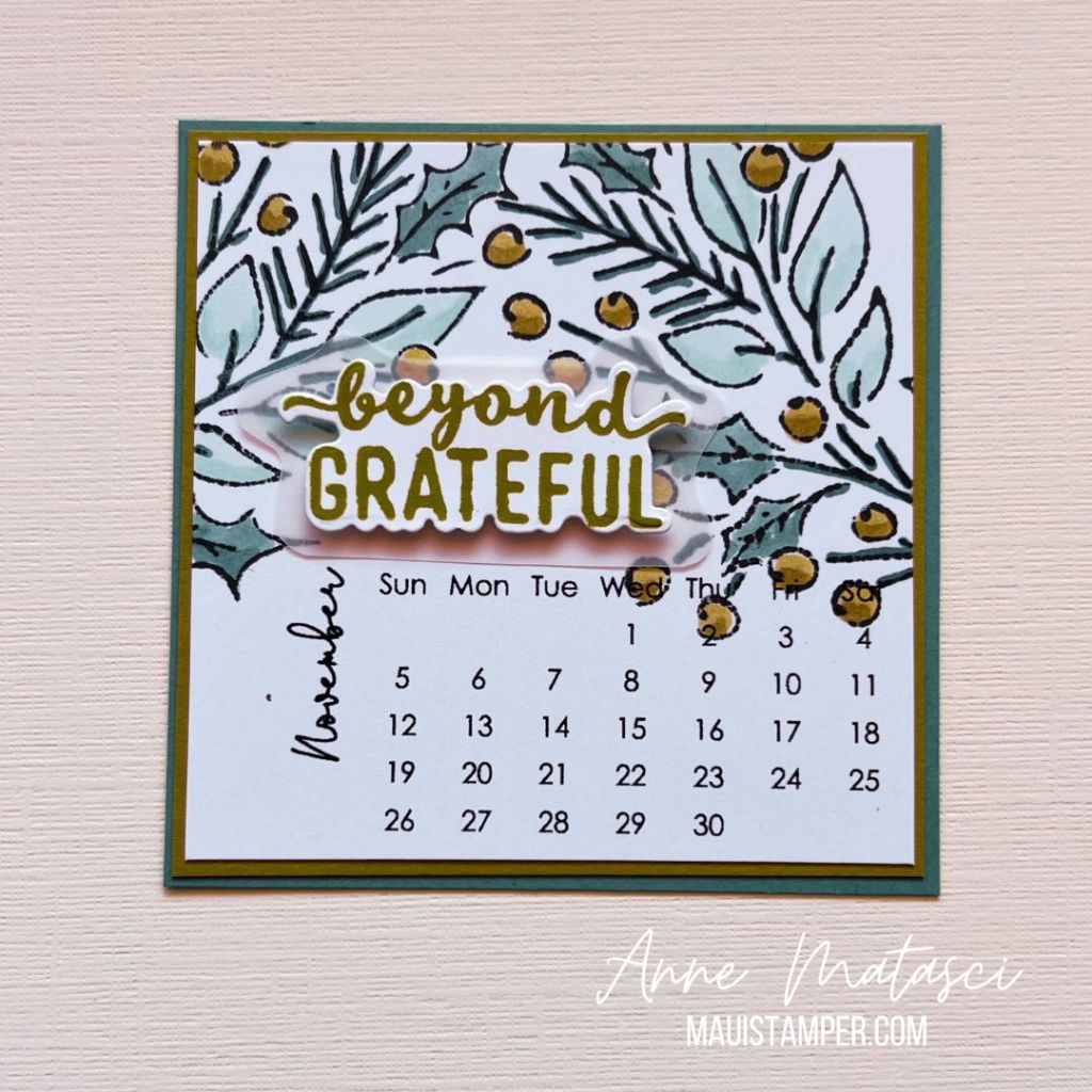 A handmade calendar page for November with the phrase "Beyond Grateful" and blue and gold foliage