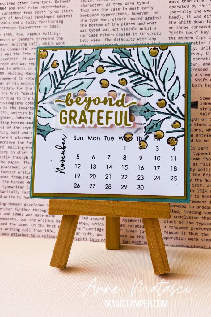 A handmade calendar page for November with the phrase "Beyond Grateful" and blue and gold foliage