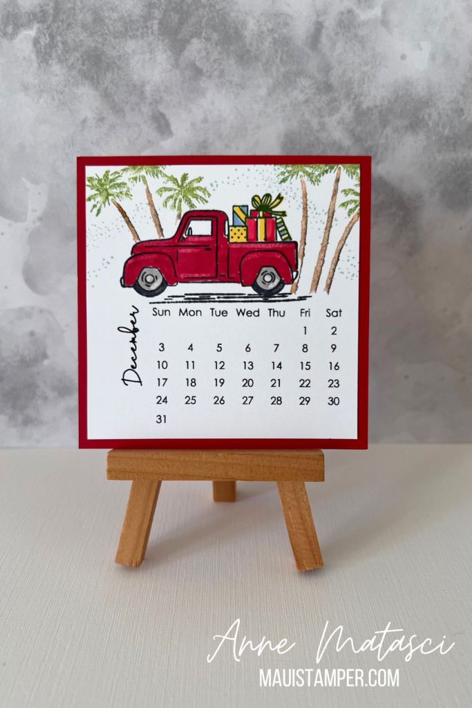 A handmade calendar page for December featuring a red truck and palm trees