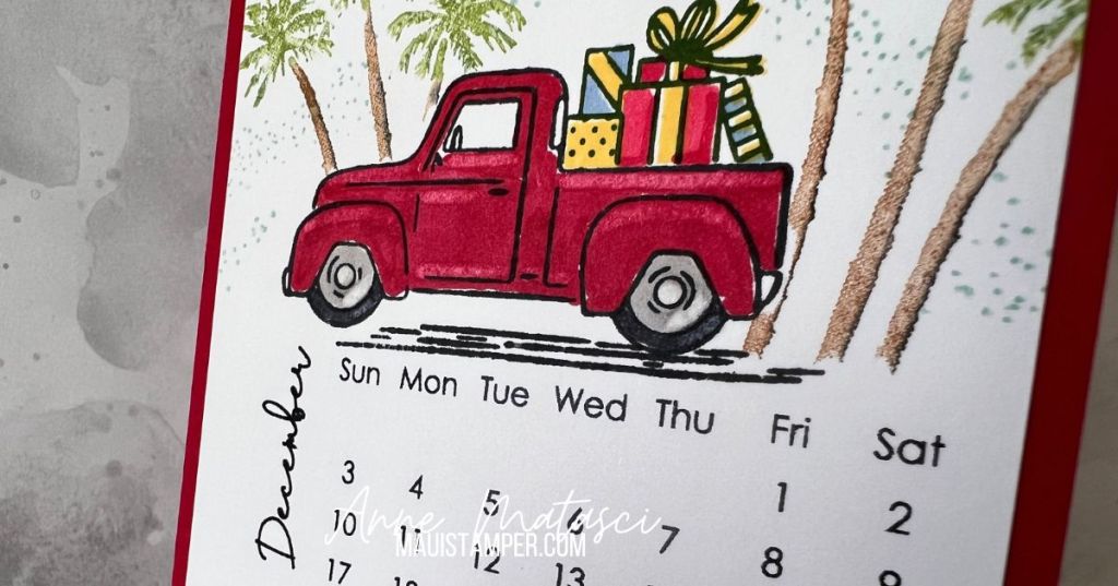 A handmade calendar page for December featuring a red truck and palm trees