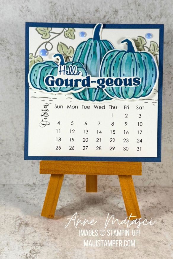 an October calendar featuring blue pumpkins