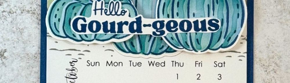 an October calendar featuring blue pumpkins