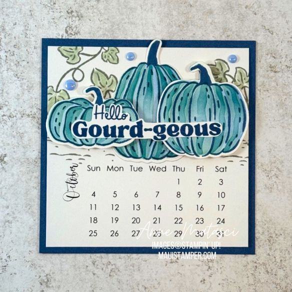 an October calendar featuring blue pumpkins