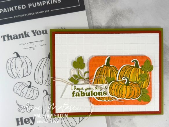 A card featuring 3 orange pumpkins